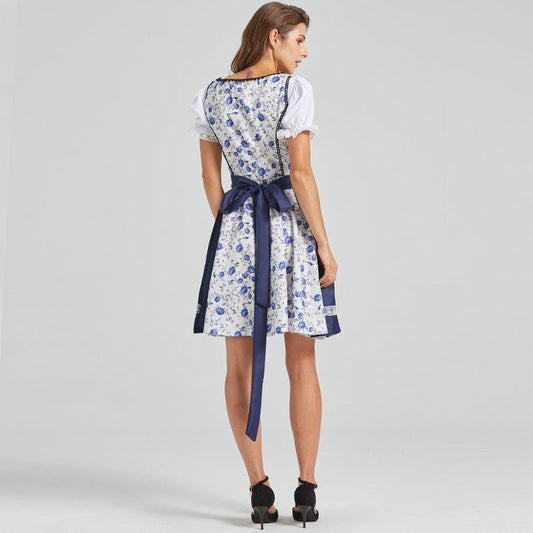 Navy blue dirndl with floral embroidery and a bow at the front