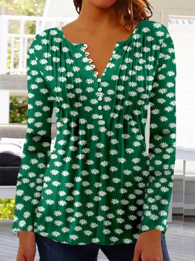 Blusa de flores degradadas con botones decorativos