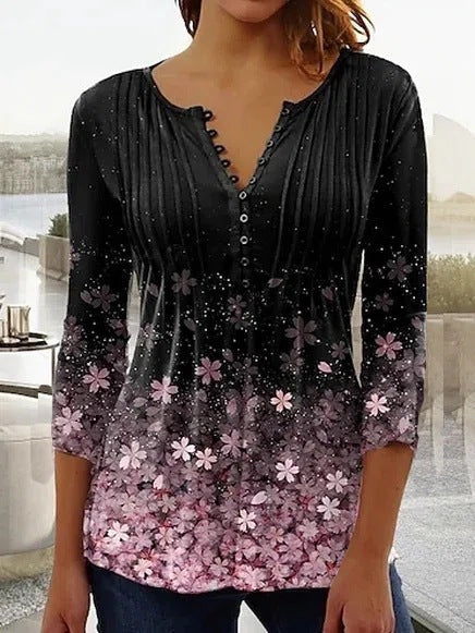 Blusa de flores degradadas con botones decorativos