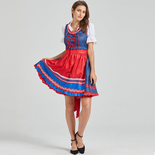 Dirndl festivo con delantal rojo y detalles tradicionales