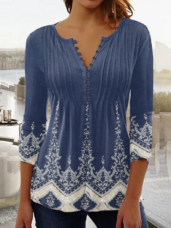 Blusa de flores degradadas con botones decorativos