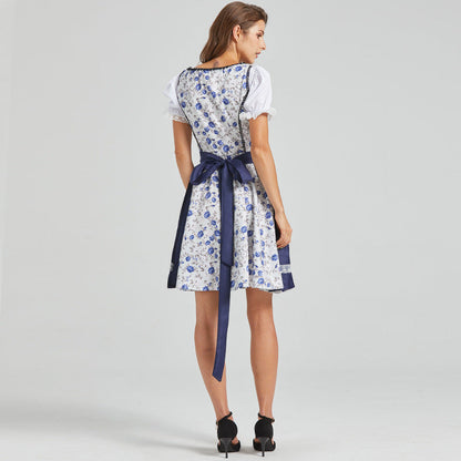 Dirndl azul marino con bordados florales y lazo al frente